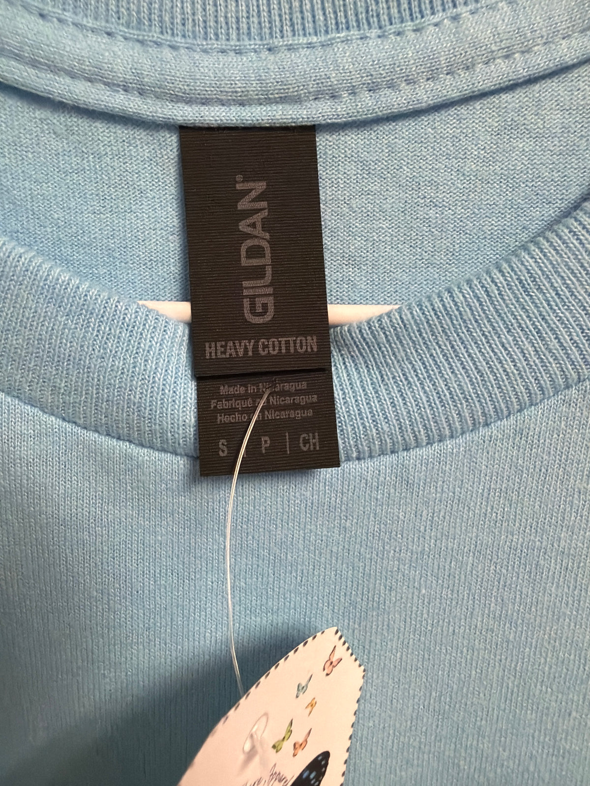 Books with Floral - Light Blue - Small graphic T-shirt by Radiant & Flare Apparel — product image 2 of 2