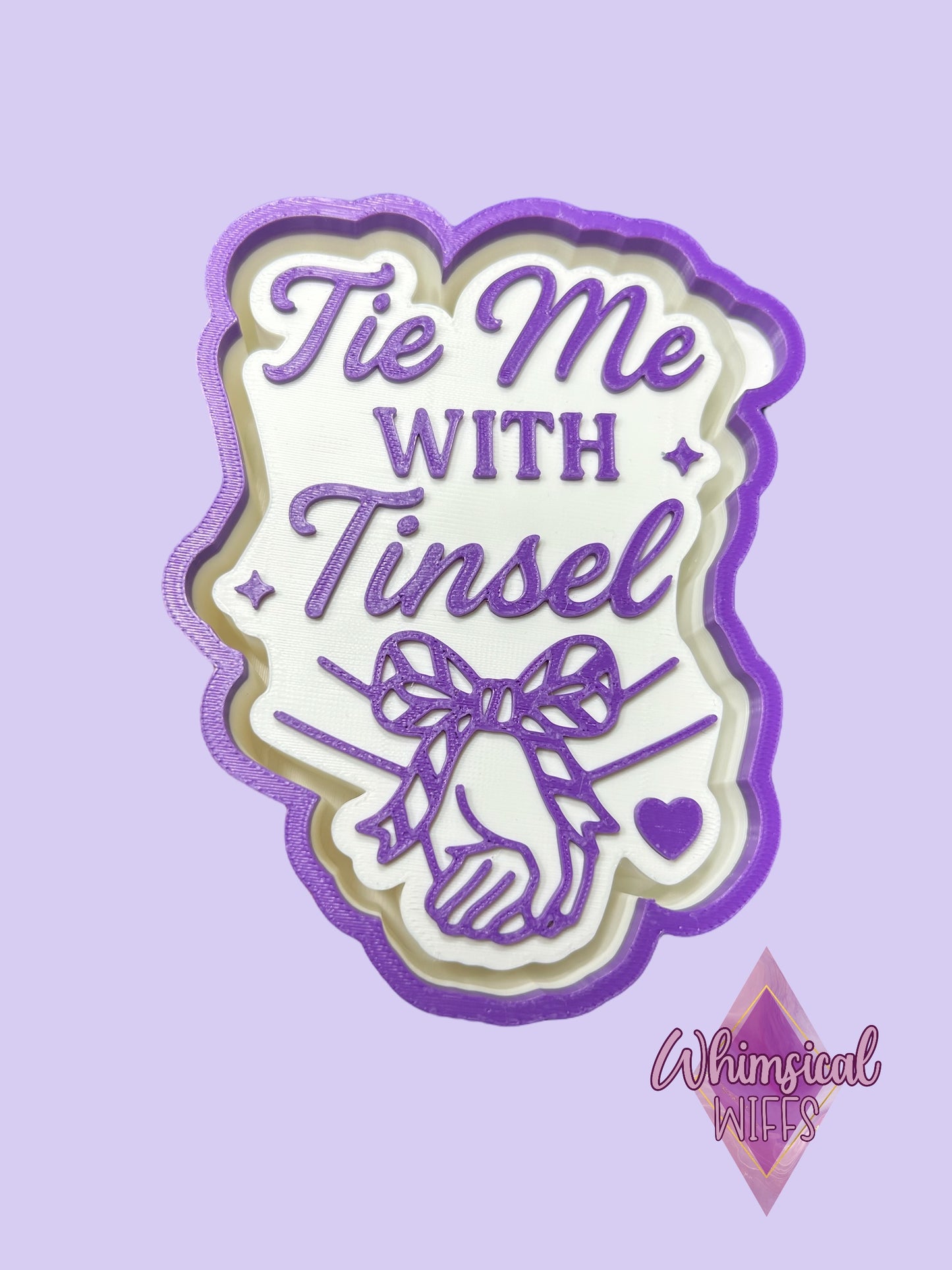 Tie me with Tinsel Mold