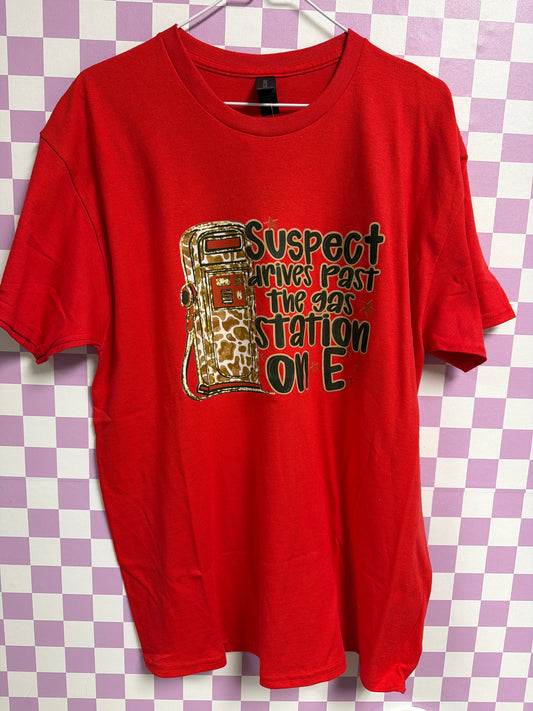 Suspect Drives on E - Red - Large graphic T-shirt by Radiant & Flare Apparel