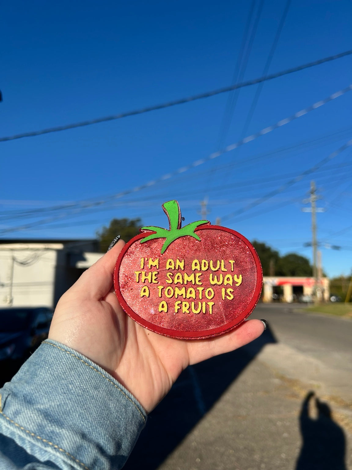I'm an adult the same way a tomato is a fruit handmade tomato freshie, shown with red glitter finish, green stem and yellow text